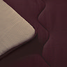 Coverless duvet on bed close up image 4