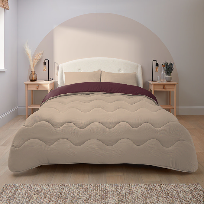 Coverless duvet on bed image 2