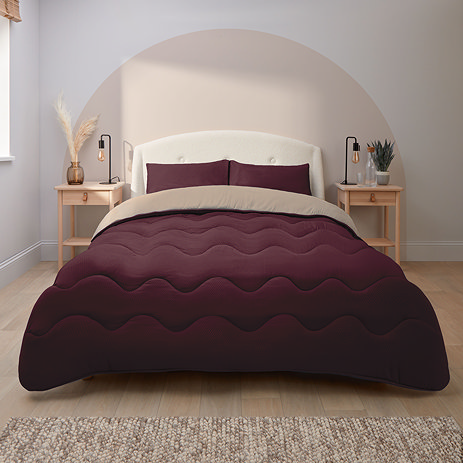Coverless Duvet in berry and natural on bed image 1