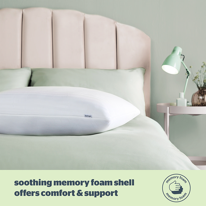 Sink in pillow on bed image 4