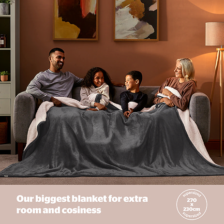 Snugsie giant blanket Grey on settee image 1