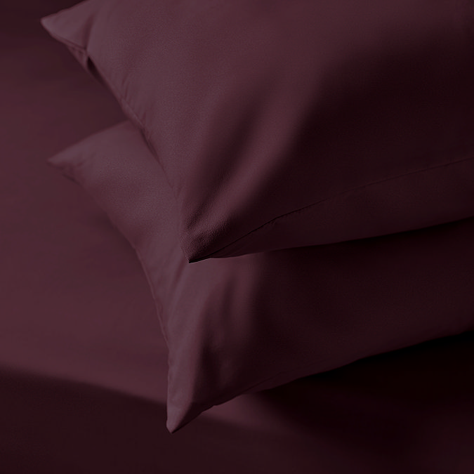 Supersoft Pillowcases in berry close up on bed image 1