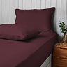 Supersoft Pillowcases in berry on bed image 3