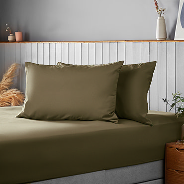 Supersoft pillowcase pair in Olive on bed image 2