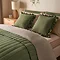 Ruffle Cushion in Green on bed image 2