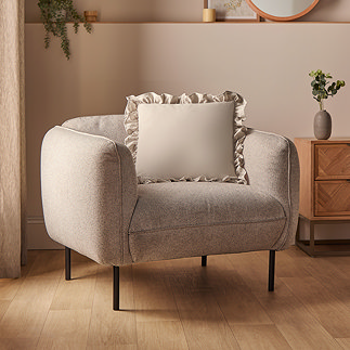 Silentnight Ruffle Cushion on chair image 1