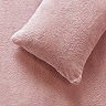 Teddy Fleece in Blush pillow  on bed image 2