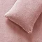 Teddy Fleece in Blush pillow  on bed image 2