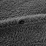 Teddy Fleece Charcoal close up on button on bed image 5