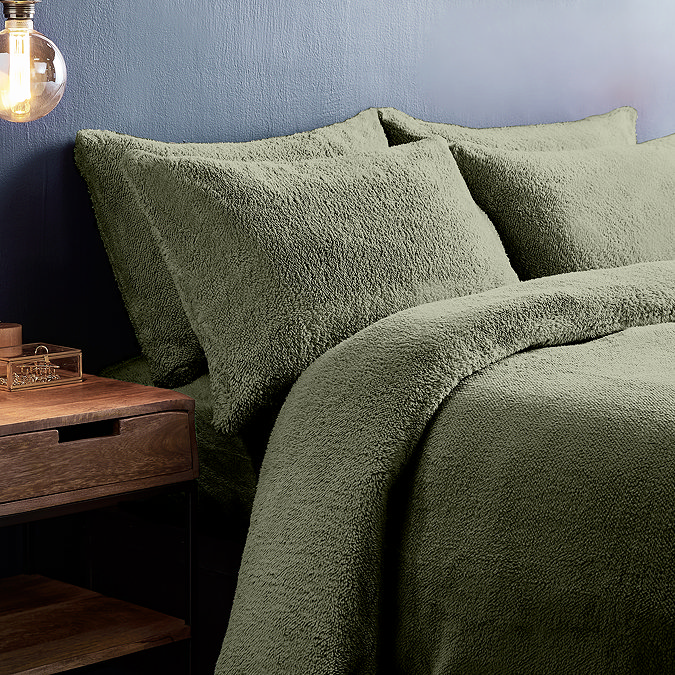 Teddy fleece in sage on bed image 2