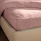 Teddy Fleece Fitted Sheet in blush on bed image 2