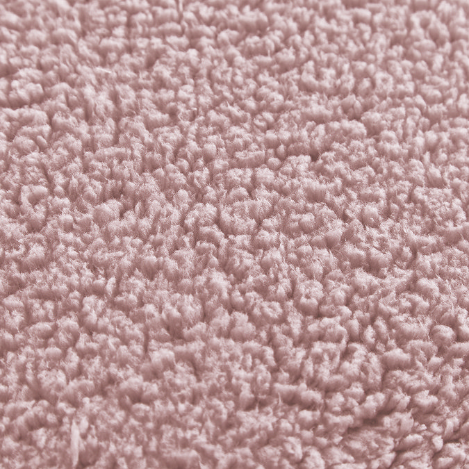 Teddy Fleece Fitted Sheet in blush close up  on bed image 4
