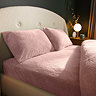 Teddy Fleece Fitted Sheet in blush on bed image 1