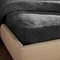 Teddy Fleece Fitted Sheet in Charcoal on bed image 2