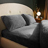 Teddy Fleece Fitted Sheet in Charcoal on bed image 1