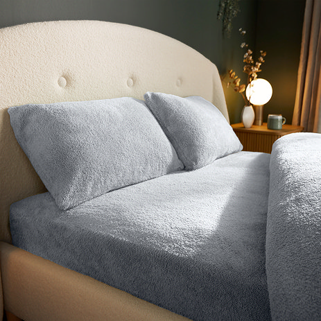 Teddy Fleece Fitted Sheet in silver on bed image 1