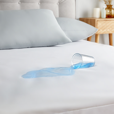 mattress protector on bed image 6