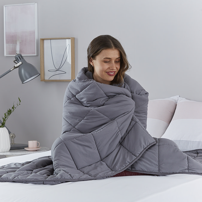 weighted blanket on bed image 3