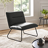 image of squared black faux leather lounge chair on beige carpet of modern living room