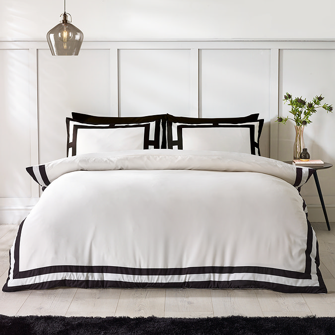 so soft mono panel duvet cover set in black on bed image