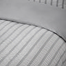 So soft seersucker Stripe in grey close up on bed image 4