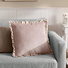 solene ruffle cushion in pink on chair image 1