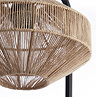 close up on woven brown lamp shade of table lamp