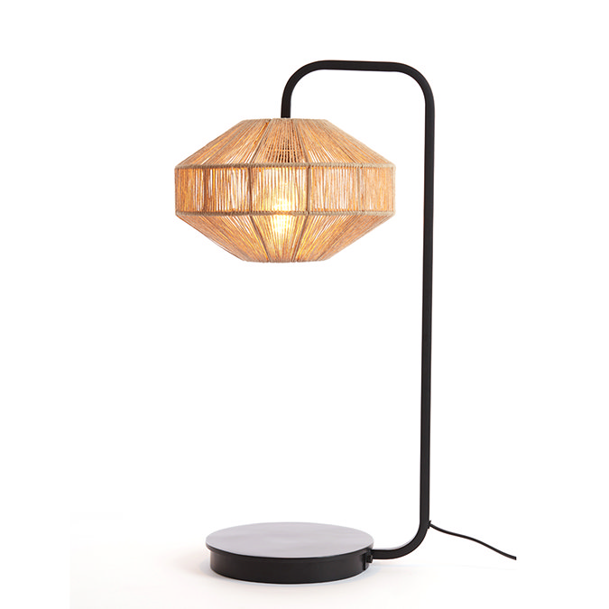 cut out image of woven table lamp with black metal body, warm glow emitting from bulb within
