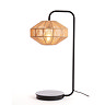 cut out image of woven table lamp with black metal body, warm glow emitting from bulb within