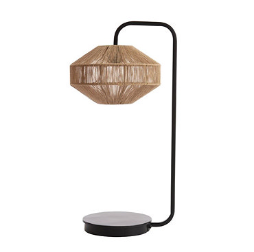 close up on woven brown lamp shade of table lamp