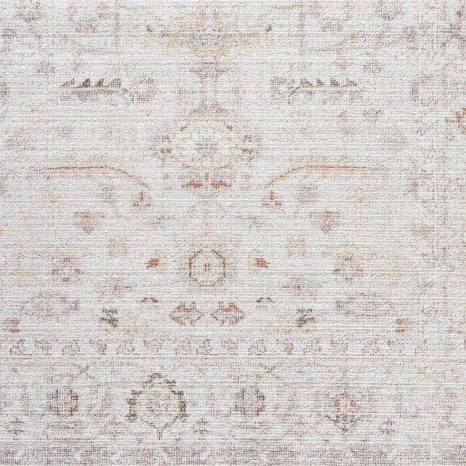 close up zoomed in image of pattern of ivory rug