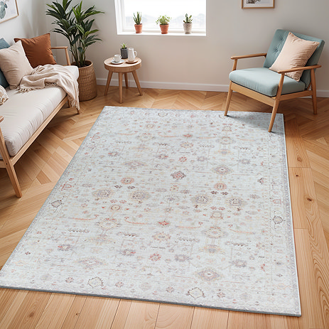 image of ivory patterned vintage rug on light wooden flooring of apartment