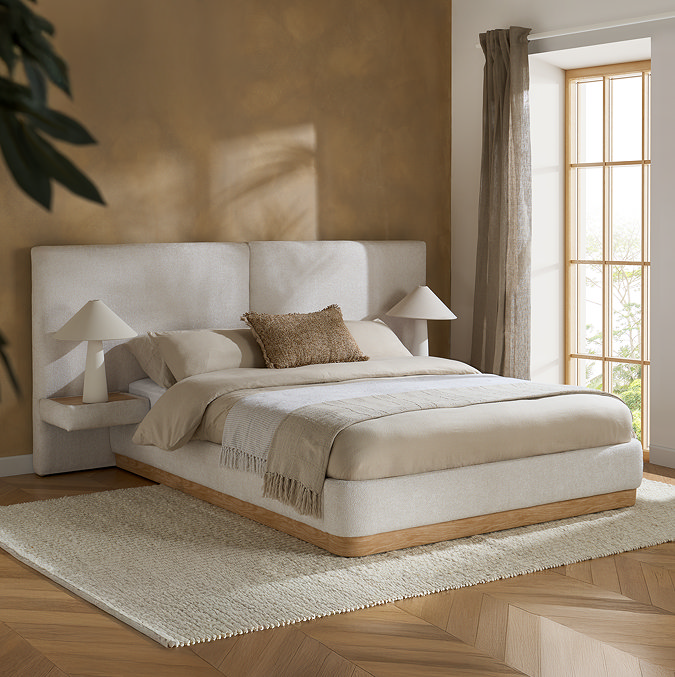 image of white bed with wood effect bottom panel and large headboard with two built in side tables