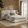 image of white bed with wood effect bottom panel and large headboard with two built in side tables