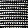 close up on black and white cushion pattern