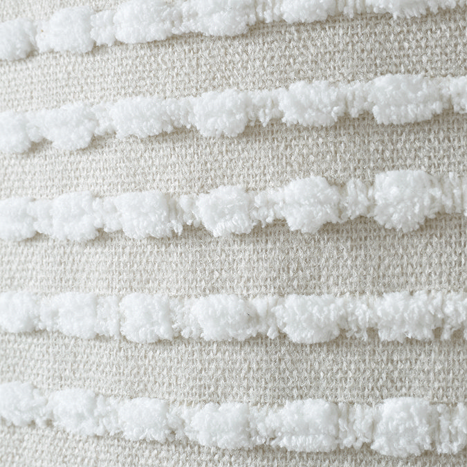 close up on natural stab stitch cushion pattern