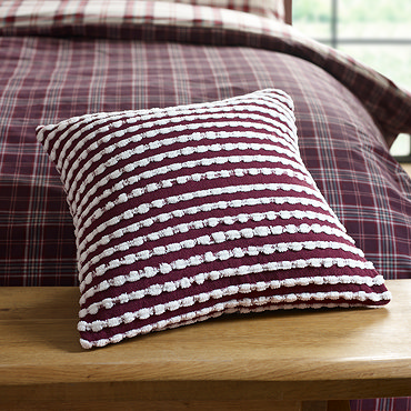 stab stitch cushion in plum