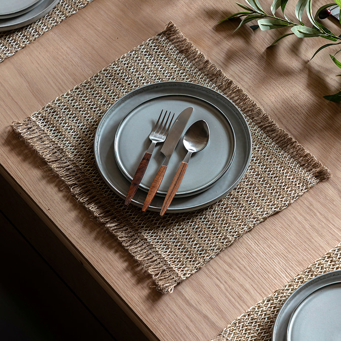 image of striped jute woven placemat with plate and cutlery on top