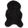 image cut out on white background of single black sheepskin rug with wavy edges