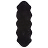 image cut out on white background of long black sheepskin rug with wavy edges