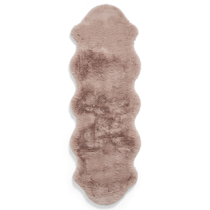 image cut out on white background of long rose pink rug with wavy edges