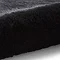 image of soft black fluff rolled up on one end