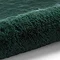 image of soft emerald green rug rolled over at one end