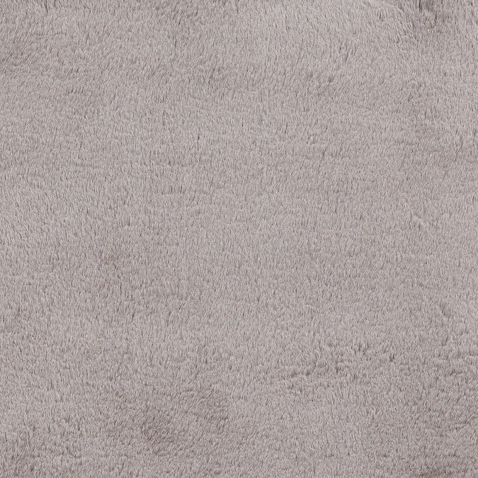 close up on material and colour of soft grey rug