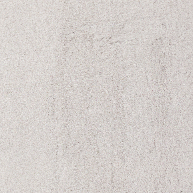 close up on material and colour of soft silver rug