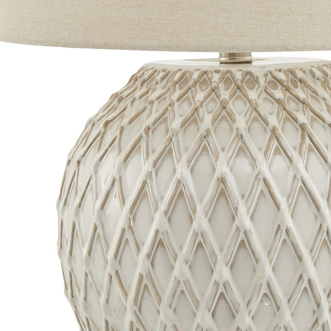 close up image on latticed texture of white ceramic vase base