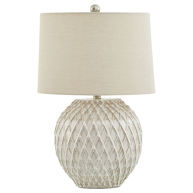 image cut out on white background of latticed ceramic white lamp