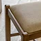 close up image of padded seat of dark oak chair