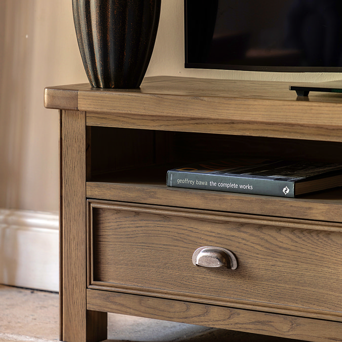 close up on drawer and shelf space of dark oak tv unit