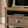 close up on drawer and shelf space of dark oak tv unit